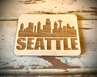 Magnet - Seattle Skyline cityscape. 3.5" X 2.5" wood magnet.  Great souvenir or memento from your favorite city.