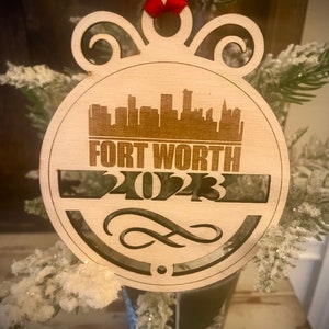 Ornament - Fort Worth Skyline cityscape. 4&quot; X 4.75&quot; wood ornament with choice of year.  Great souvenir or memento from your favorite city