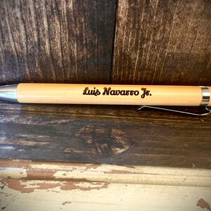 Custom engraved wood writing pen, personalized pen available in bulk quantities; available with names, logos, dates, etc..