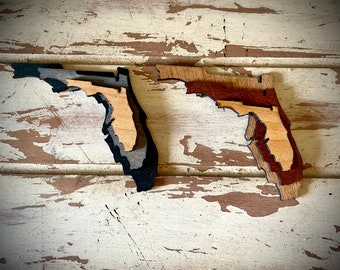 Florida 3-layer stacked state laser cut wood magnet available in brown tones or gray tones.