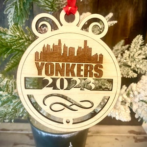Ornament - Yonkers Skyline cityscape. 4&quot; X 4.75&quot; wood ornament with choice of year.  Great souvenir or memento from your favorite city