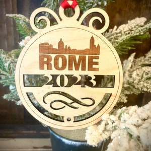Ornament - Rome Skyline cityscape. 4&quot; X 4.75&quot; wood ornament with choice of year.  Great souvenir or memento from your favorite city