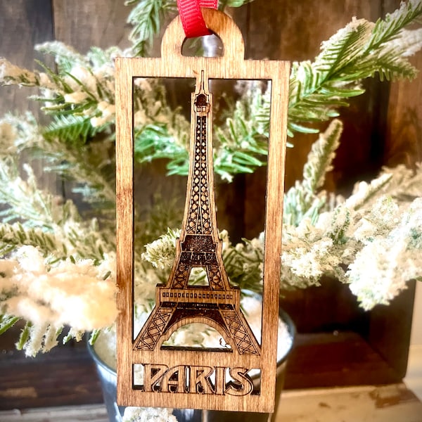 Paris Ornament with engraved Eiffel Tower likeness 5" X 2.1" wood ornament.  Great souvenir or memento to remember Paris