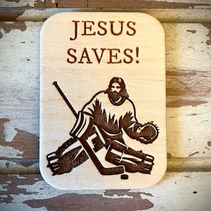 Funny magnet:  Jesus saves! Hockey magnet with Jesus in goal