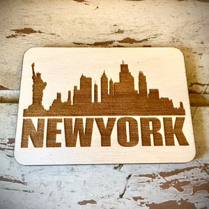 Magnet - New York City Skyline cityscape. 3.5&quot; X 2.5&quot; wood magnet.  Great souvenir or memento from your favorite city.
