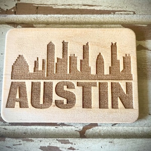 Magneet: stadsgezicht Austin Skyline. Houten magneet 3,5 x 2,5 inch.  Geweldig souvenir of aandenken aan je favoriete stad.