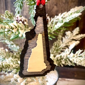New Hampshire 3-layer stacked state ornament laser cut wood ornament, New Hampshire gift tag available in brown tones or gray tones.