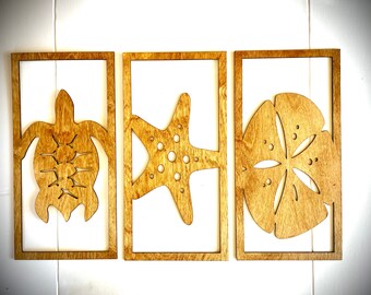 Beach life wood wall art with sea turtle, starfish, and sand dollar, 3 panel set in multiple sizes and finishes