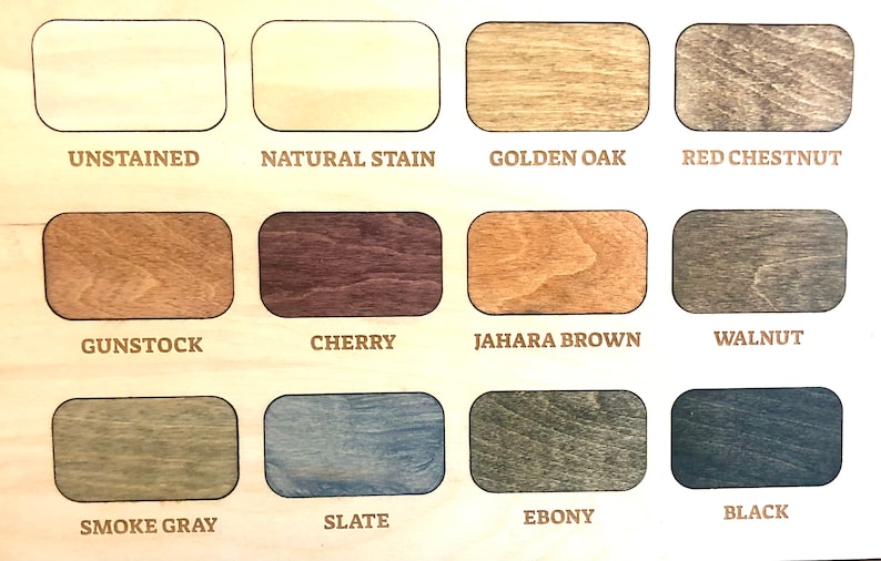 May include: A wood stain color chart featuring twelve rectangular samples arranged in three rows. Each sample displays a unique wood grain finish labeled with text: Unstained, Natural Stain, Golden Oak, Red Chestnut, Gunstock, Cherry, Jahara Brown, Walnut, Smoke Gray, Slate, Ebony, and Black.