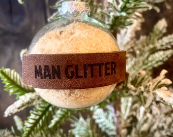 Funny ornament.  Man Glitter ornament. 2.5 inch acrylic ornament with engraved leather man glitter label, filled with sawdust.