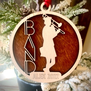 Marching band female trombone player 2-layer personalized laser cut wood Christmas ornament, gift tag available unfinished or stained