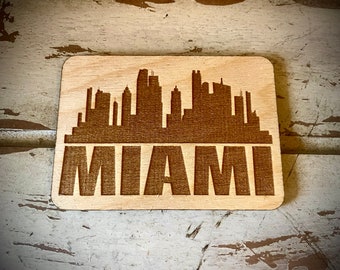 Magnet - Miami Skyline cityscape. 3.5" X 2.5" wood magnet.  Great souvenir or memento from your favorite city.