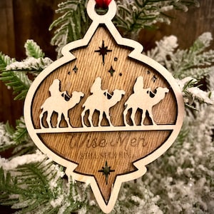 3 wise men riding camels.  Wise men still seek him.   2-layer laser cut wood Christmas ornament, gift tag available unfinished or stained