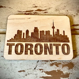 Magnet - Toronto Skyline cityscape. 3.5&quot; X 2.5&quot; wood magnet.  Great souvenir or memento from your favorite city.
