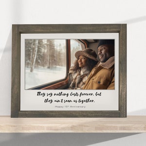 May include: A framed photo of a couple looking out of a car window. The photo is on a wooden shelf. The caption reads: "They say nothing lasts forever, but they ain't seen us together. -Happy 15th Anniversary"