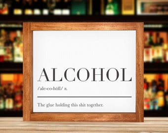 May include: A framed sign with the word "ALCOHOL" in large, bold letters. The definition is given as "ale-co-holl/n. The glue holding this shit together."