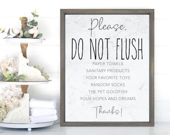 May include: A framed sign with a white marble background and black text that reads "Please. DO NOT FLUSH. Paper towels, Sanitary products, Your favorite toys, Random socks, The pet goldfish, Your hopes and dreams. Thanks!"