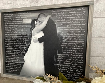 May include: A black and white photo of a couple dancing at their wedding. The photo is printed on a canvas and framed in a rustic wood frame. The text in the image is a heartfelt wedding vow from the groom to the bride.