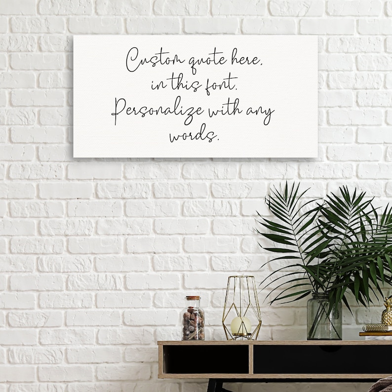 May include: White canvas with black text that reads "Custom quote here. in this font. Personalize with any words."