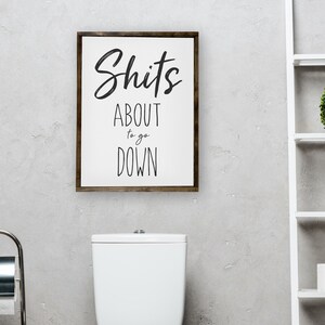 Shits About To Go Down — Bathroom Humor Decor, Custom wood frame canvas, Choose Your Background, Multiple Stain Options Dark walnut