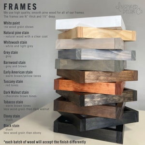 May include: A stack of wooden picture frames in various wood stains, including white paint, natural pine, whitewash, grey, barnwood, early American, Tuscany, dark walnut, tobacco, ebony, and black. The frames are 3/4 inch thick and 1 1/2 inches deep. Each batch of wood will accept the finish differently.
