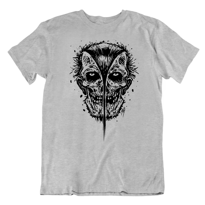 May include: A gray t-shirt with a black and white illustration of a skull with a spiky hairdo.