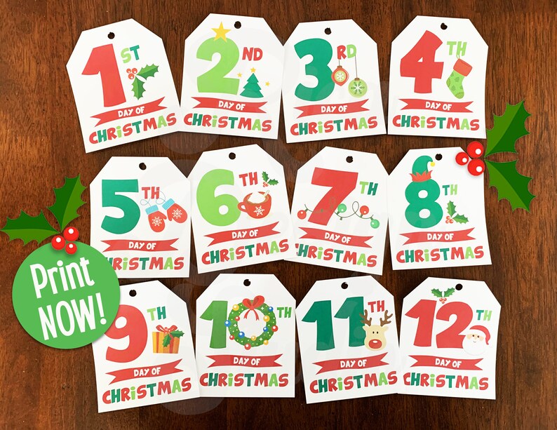 May include: Twelve printable Christmas countdown tags with festive illustrations and the text "Day of Christmas" on each tag. The tags are numbered 1st through 12th.