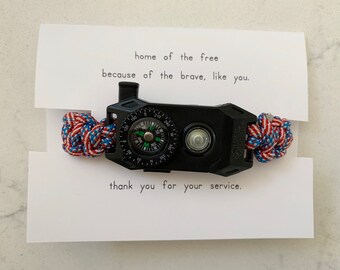 Land Of The Free-Because of the Brave Card with Patriot Paracord Bracelet - 8 in 1 Paracord & 5 in 1 Buckle