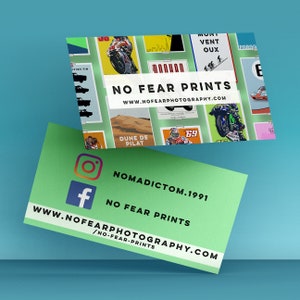 May include: Two business cards with a green and white colour scheme. The top card features a collage of colourful images of motorcycles and cars. The text "NO FEAR PRINTS" and "WWW.NOFEARPHOTOGRAPHY.COM" is printed on the card. The bottom card features the text "NOMADICTOM.1991", "NO FEAR PRINTS", "WWW.NOFEARPHOTOGRAPHY.COM", and "/NO-FEAR-PRINTS". The card also features social media icons for Instagram and Facebook.