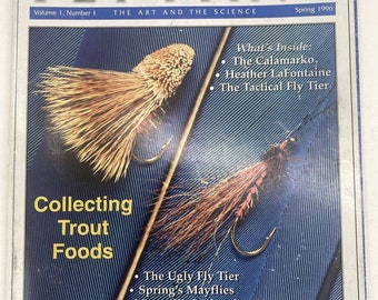 May include: A magazine cover for Western Fly Tying, Volume 1, Number 1, Spring 1996. The cover features a close-up of a fly fishing lure with the text "Collecting Trout Foods" and a list of articles inside the magazine.