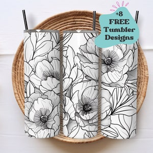Może przedstawiać: Trzy kubki ze stali nierdzewnej z czarno-białym wzorem kwiatowym. Kubki znajdują się w plecionym koszu. Tekst '+8 FREE Tumbler Designs' znajduje się w turkusowym polu z różowym obramowaniem.