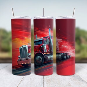 May include: Three red stainless steel tumblers with a graphic of a red semi-truck speeding down a highway with a red and orange sunset in the background.