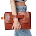 see more listings in the Clutches section