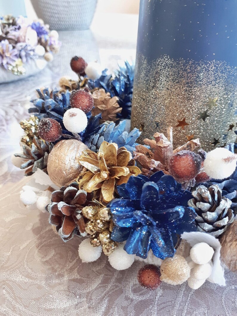 A colorful winter candle wreath ring for a table decor. Etsy