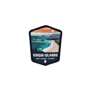May include: An embroidered patch featuring a scenic view of a beach and ocean, with the text "VIRGIN ISLANDS NATIONAL PARK" printed in white on a black background.