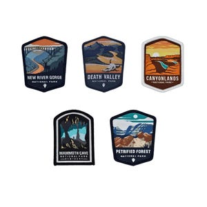 May include: Five embroidered patches featuring National Park designs: New River Gorge with a bridge, Death Valley with a skull, Canyonlands with rock formations, Mammoth Cave with interior rock structures, and Petrified Forest with desert terrain.