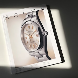 Original Rolex Magazine Issue #9 exclusive retailers collectible, Oyster Perpetual watch cover, coffee table luxury Swiss watch book.