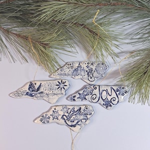 Handmade Ceramic North Carolina Shaped Christmas Ornament: With Landscapes and Joy Greeting