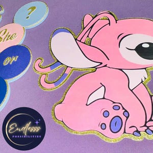 May include: Pink cartoon character with blue accents and gold glitter trim. The image includes gender reveal party decorations with the words "She or he" and a question mark. A logo with the text "Endlesss Possibilities" is also visible.
