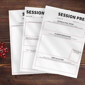 May include: Three white sheets of paper with red borders and the text "SESSION PREP" are displayed on a dark wooden surface. The sheets have sections for notes and planning. A collection of red dice is in the lower left corner.