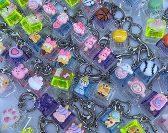 Porte-clés avec clavier mécanique super mignon avec breloques - Jouet sensoriel amusant et anti-stress - Parfait pour tous les âges - Adapté à l'ASMR