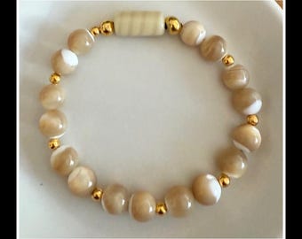 The Modern Mother of Pearl beaded bracelet.  Handmade/ Tan and White/Slip on easy.