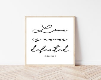 St. John Paul II quote, "Love is never defeated."  | Printable Catholic home decor | Catholic print | Catholic saint quote | Catholic gift