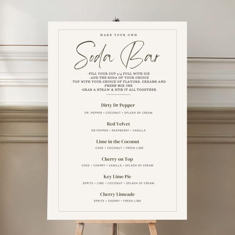 May include: A white sign with black text that reads "Make Your Own Soda Bar". The sign lists different soda combinations with ingredients like Dr. Pepper, coconut, raspberry, vanilla, Coke, cherry, lime, and Sprite.