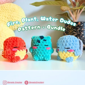 May include: Three small, round, plush crochet figures in red, teal, and light blue with yellow accents and pink cheeks. The text "Fire, Plant, Water Dudes Pattern - Bundle" is displayed above them. The figures have closed eyes and simple, soft, textured yarn construction.