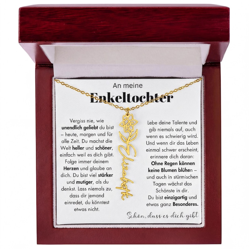 An meine Enkeltochter necklace with a gold pendant featuring a flower design.