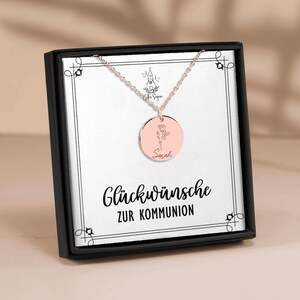 a picture of a necklace in a box