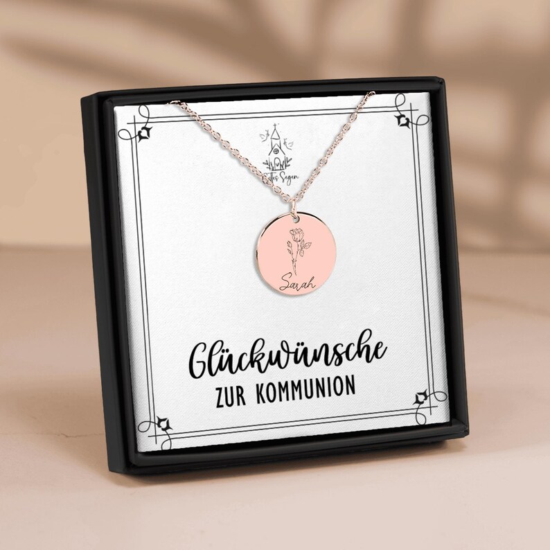 a picture of a necklace in a box