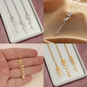 four different types of personalized necklaces on a tray