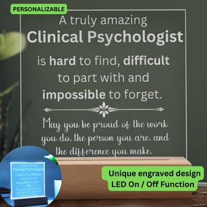 May include: A personalised acrylic plaque with an engraved message that reads "A truly amazing Clinical Psychologist is hard to find, difficult to part with and impossible to forget. May you be proud of the work you do, the person you are, and the difference you make." The plaque has a wooden base and a built-in LED light that can be switched on and off.